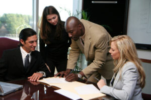 Business Consulting Team Signing Contract
